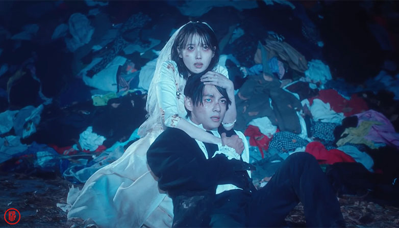 IU and BTS V in “Love Wins All” MV. | YouTube