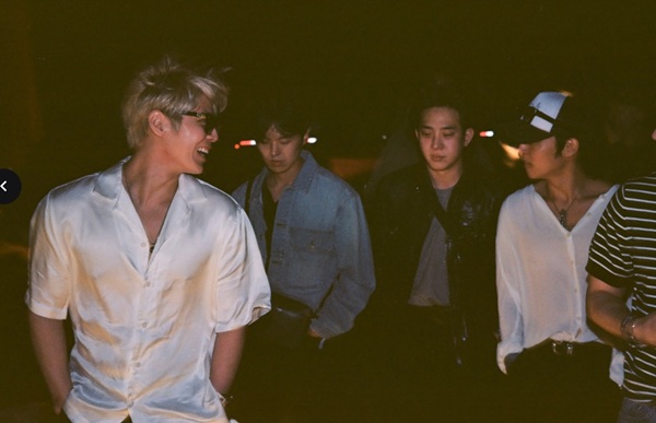 The Rose band members walking through Coachella at night
Credit: Photo by Richard Hama, Courtesy of THE ROSE: COME BACK TO ME